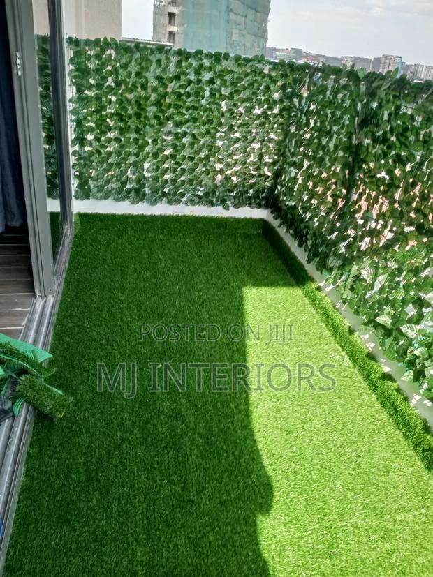Balcony Transformation – Artificial Grass Privacy Fence Solutions