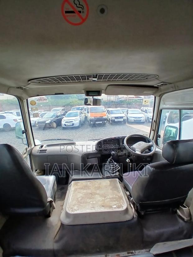 Toyota Coaster 2013 White - thumbnail 6