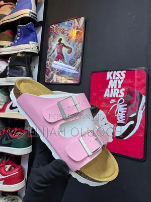 Pink Buckle Cork Sandals.(Birkenstock)