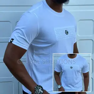 Crew Neck T-Shirt Featuring a Textured Graphic Emblem on the Chest