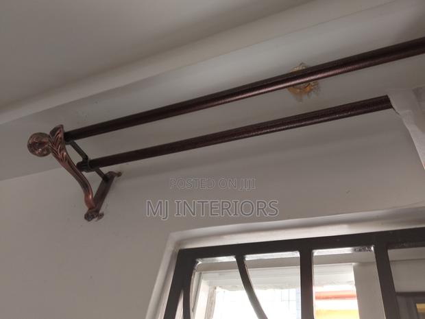 Jua Kali Rods With Cobra End Flowers