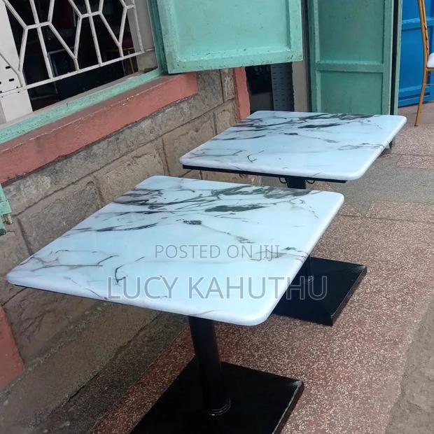 White Eboxy Tables With Hooks to Hang Handbags - main view