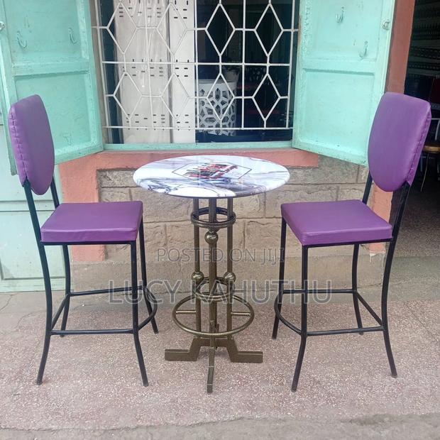 Two Purple Curved Restaurant Chairs With Table - main view