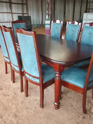 A Dinning Table With 8 Chairs Blue/Brown Mahogany Wood