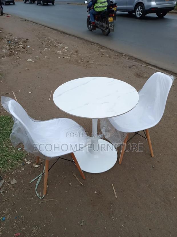 2 Seater Eames Chair and White Round Table
