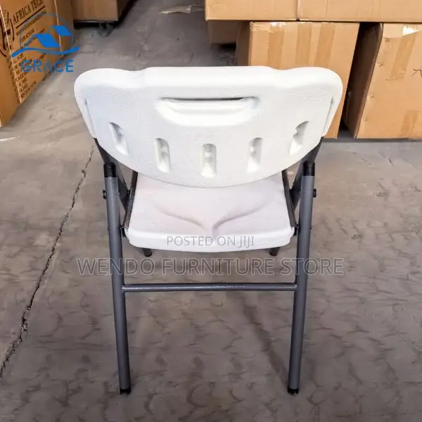 Office Chair : White Plastic Folding Chair With a Gray Metal Frame.