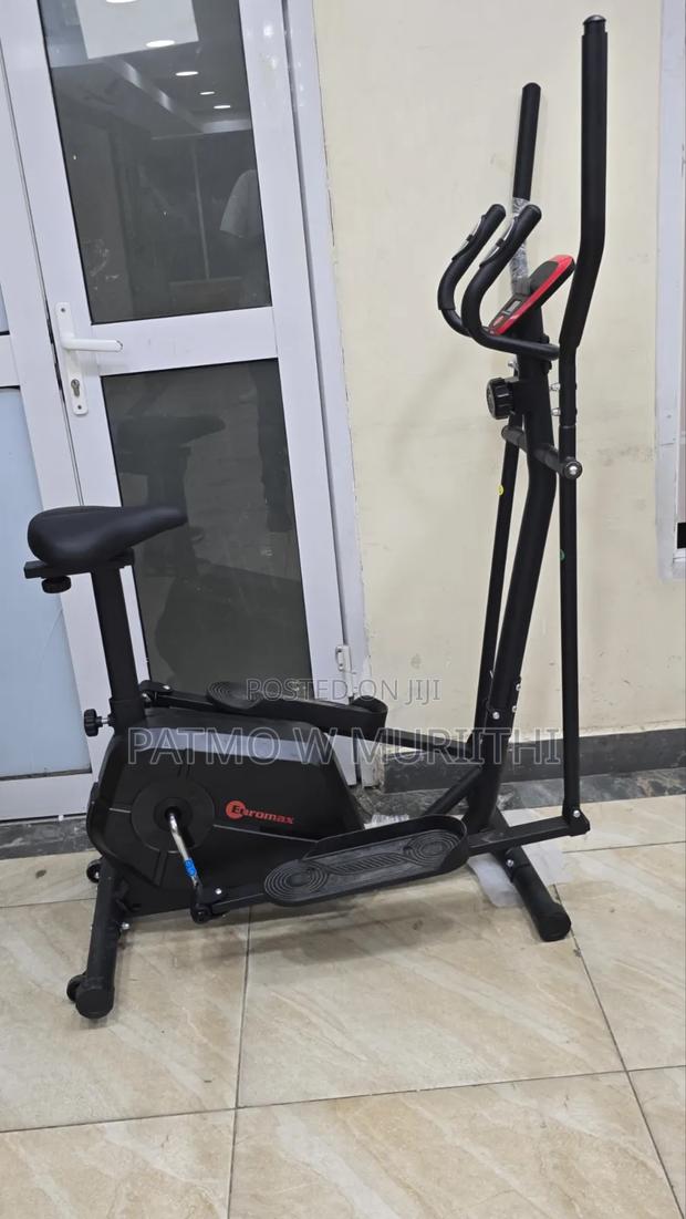 A Euromax Elliptical Cross Trainer Exercise Machine With a Seat.