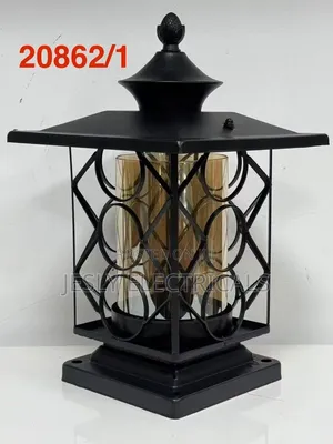 Black Metal Outdoor Pillar Lantern With Amber Glass Panels