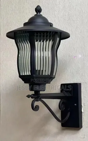 Black Metal Outdoor Wall Lantern With Ribbed Glass Panels