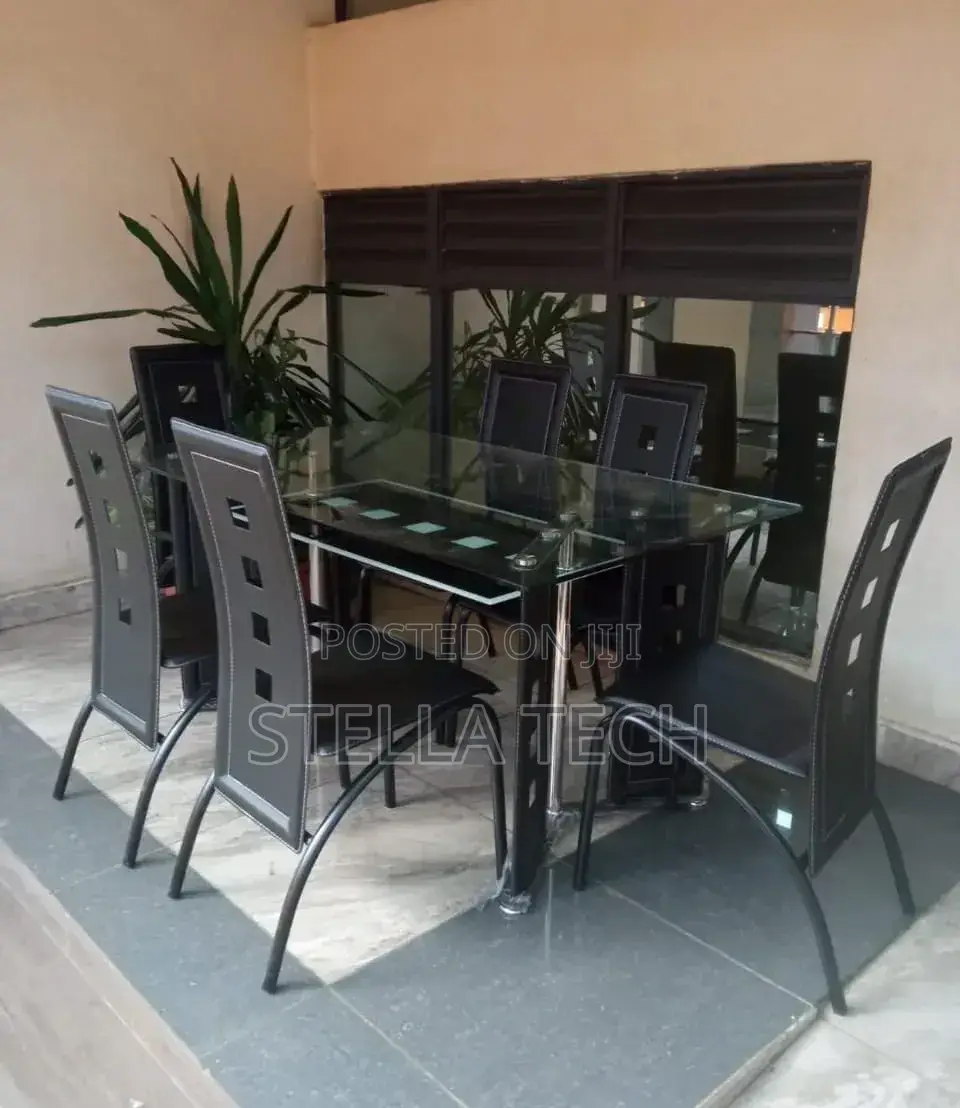 Executive 6 Sitter Glass Dinning Table With Leather Seat