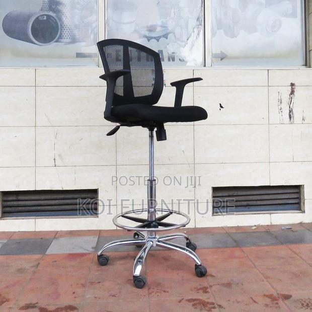 Office Chair : Ergonomic Mesh Cashier Chair With a Chrome Footrest.