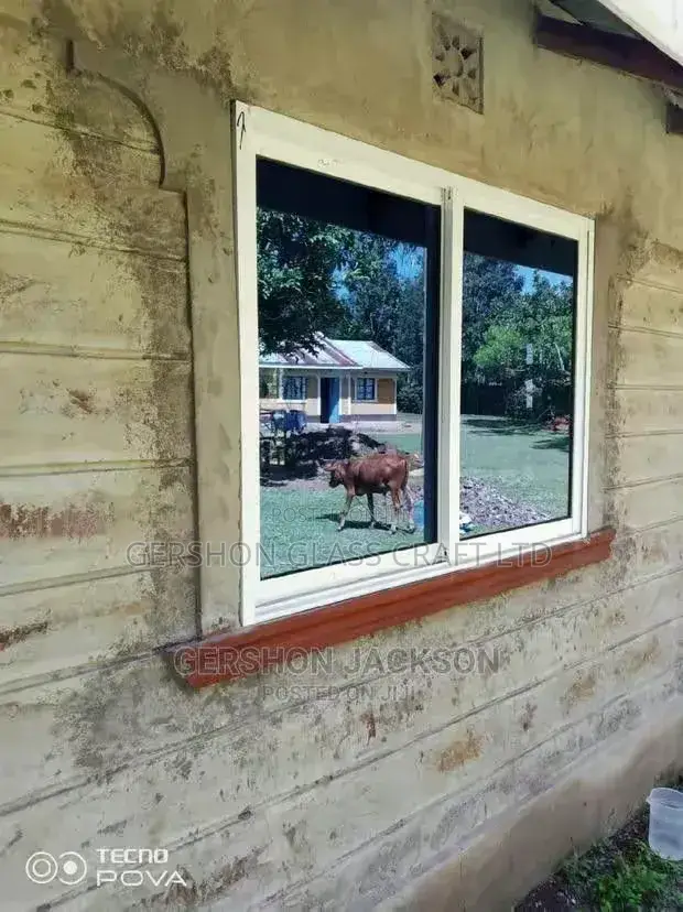 One Way Glass and Aluminum Windows