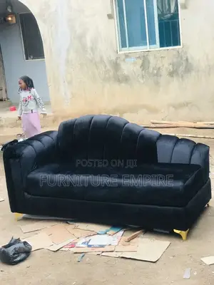 Luxurious Black Velvet Sofa With Gold Legs
