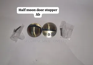 Bronze-Finished Ab Half-Moon Door Stoppers.