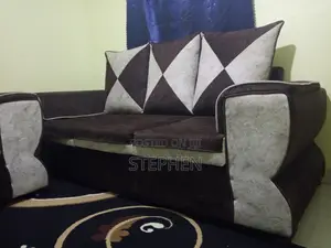 Fairly Used 5 - Seater Lowback Sofas With Brown Finishing