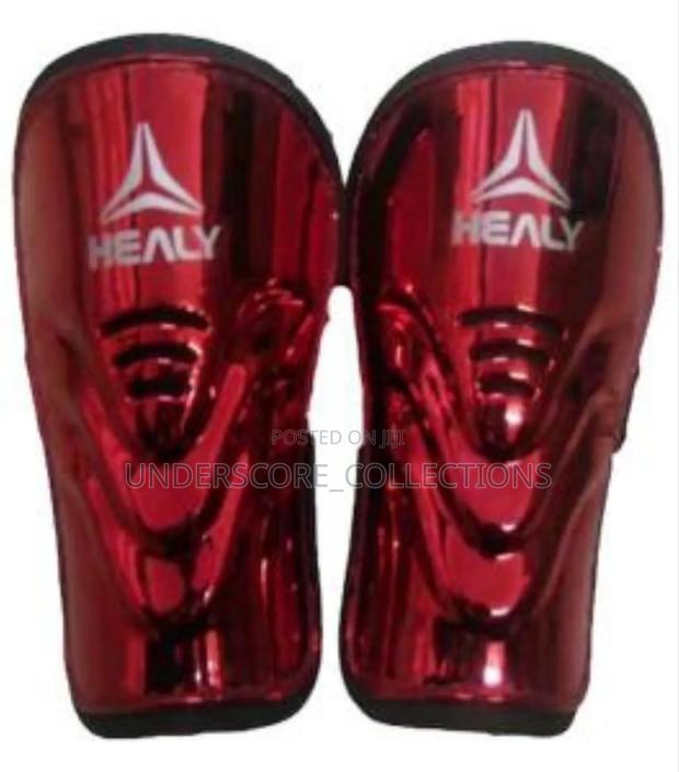 Red Metallic Nealy Brand Football Shin Guards
