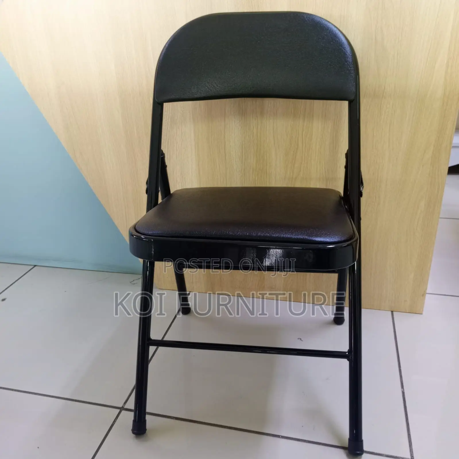 Office Chair : Padded Black Leather Foldable Chair With a Steel Frame