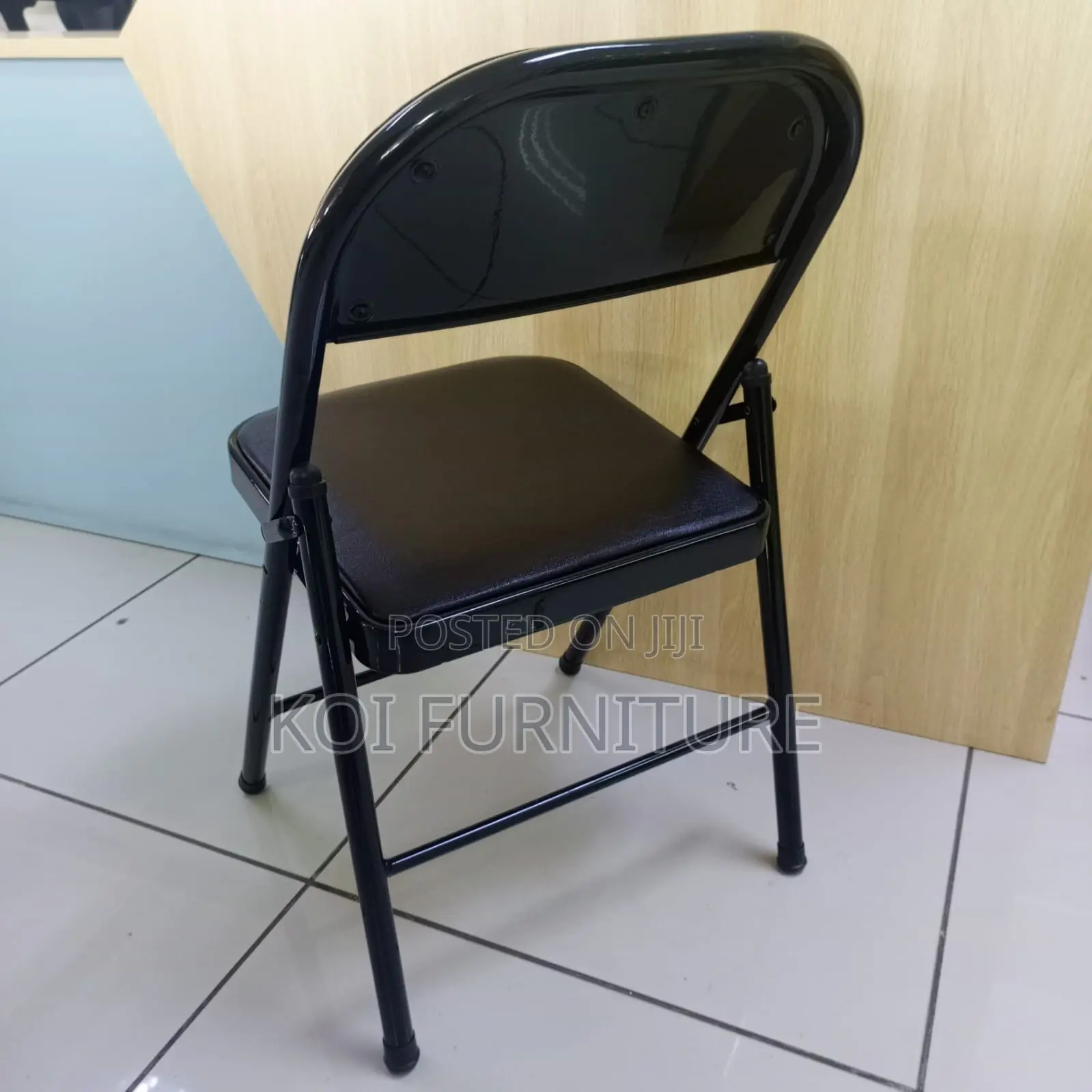Office Chair : Padded Black Leather Foldable Chair With a Steel Frame