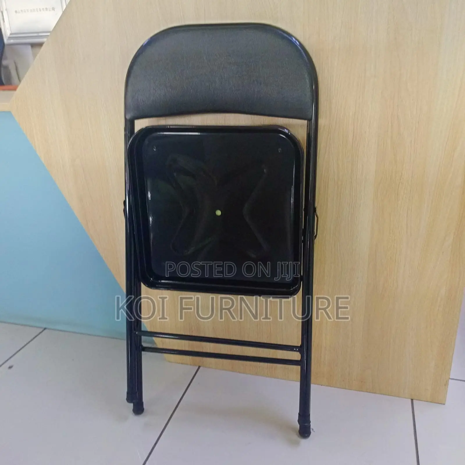 Office Chair : Padded Black Leather Foldable Chair With a Steel Frame