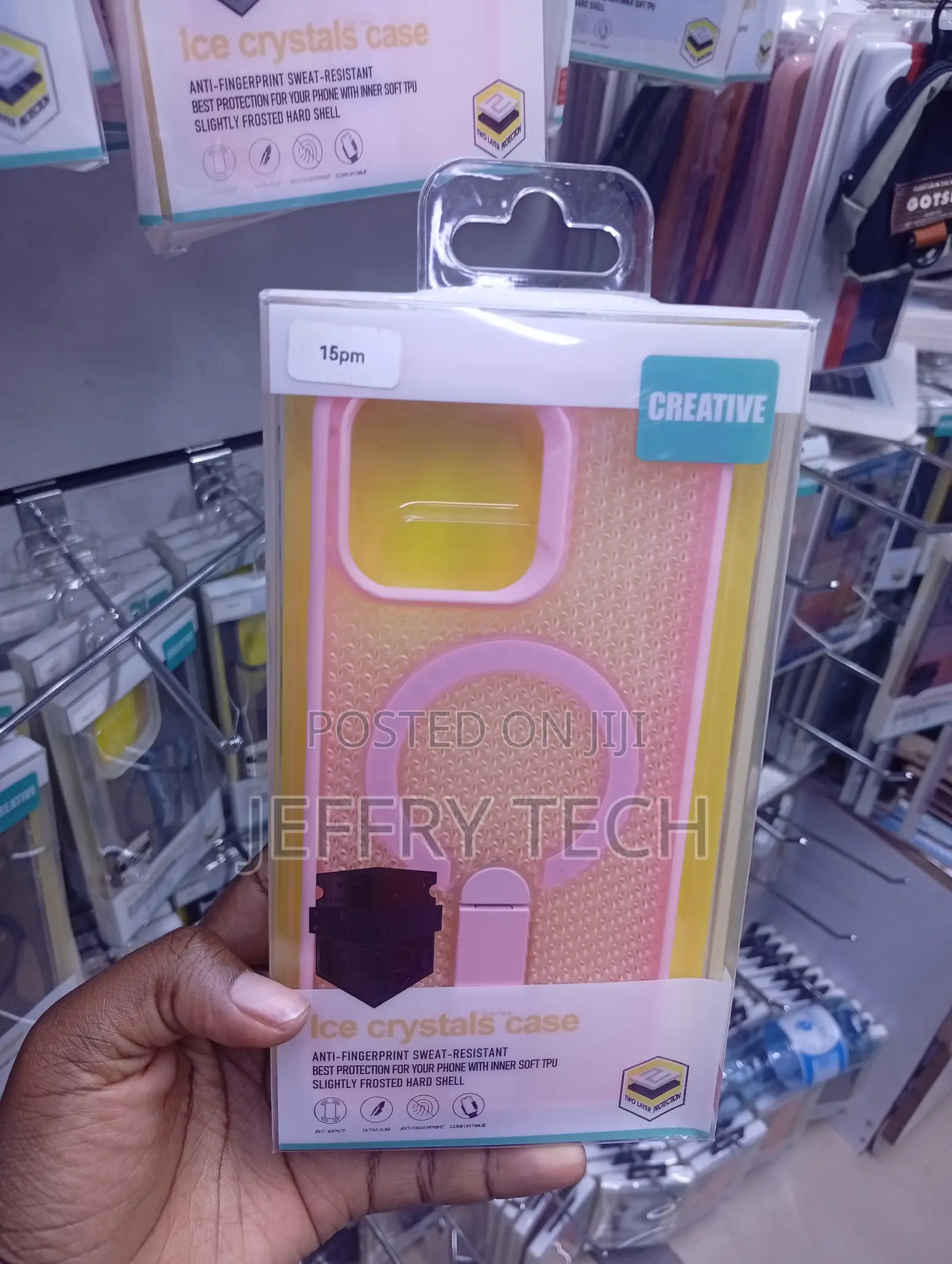 iPhone 15 Pro Max in Pink and Yellow With a Magnetic Ring Crystal Case
