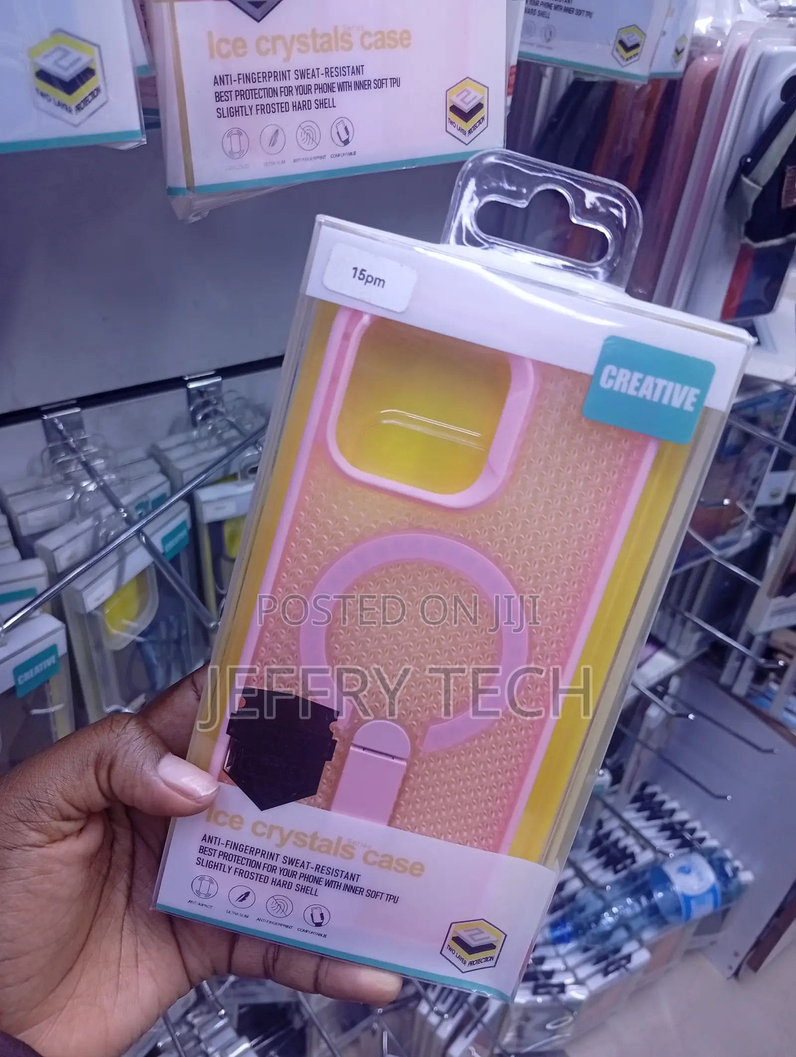 iPhone 15 Pro Max in Pink and Yellow With a Magnetic Ring Crystal Case