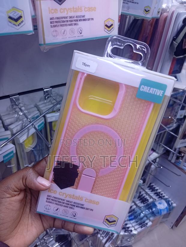 iPhone 15 Pro Max in Pink and Yellow With a Magnetic Ring Crystal Case - thumbnail 2