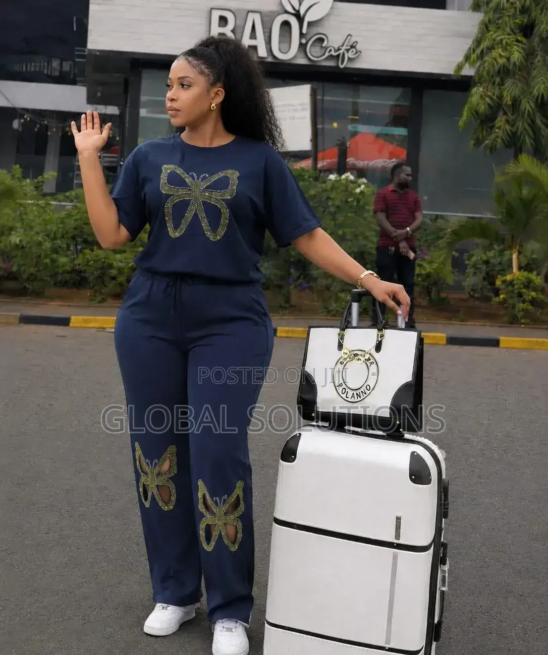 Two-Piece Sweat Suit With a Gold Butterfly Rhinestone Embellishments