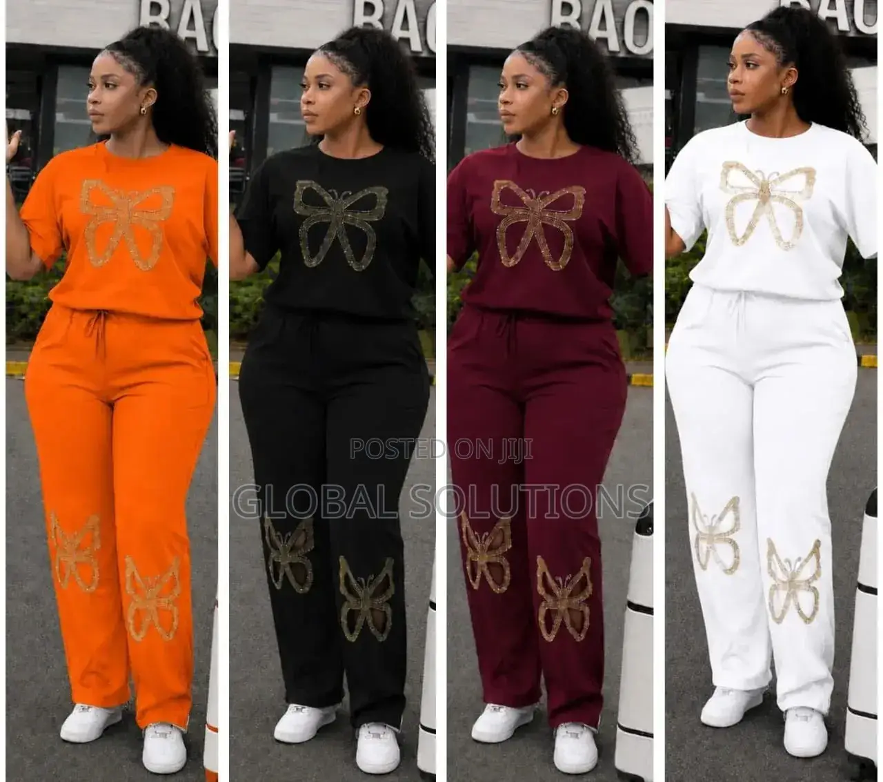 Two-Piece Sweat Suit With a Gold Butterfly Rhinestone Embellishments