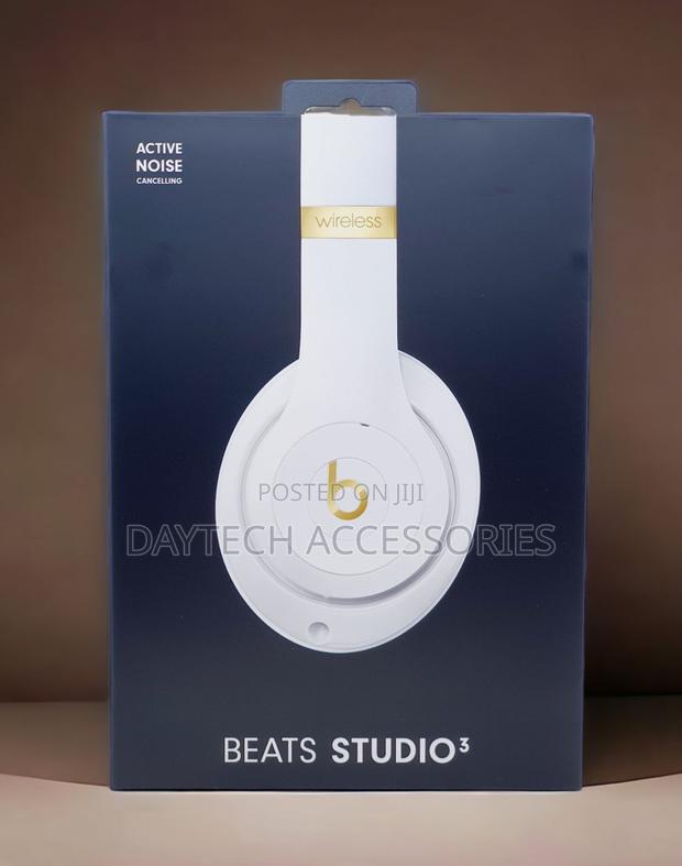 The Beats Studio3 Wireless Headphones in White With Gold Accents.