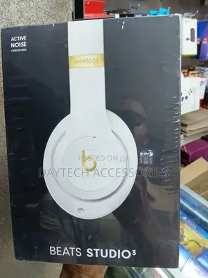 The Beats Studio3 Wireless Headphones in White With Gold Accents.