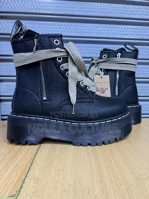 Dr Martens Boots and Gucci Sneakers