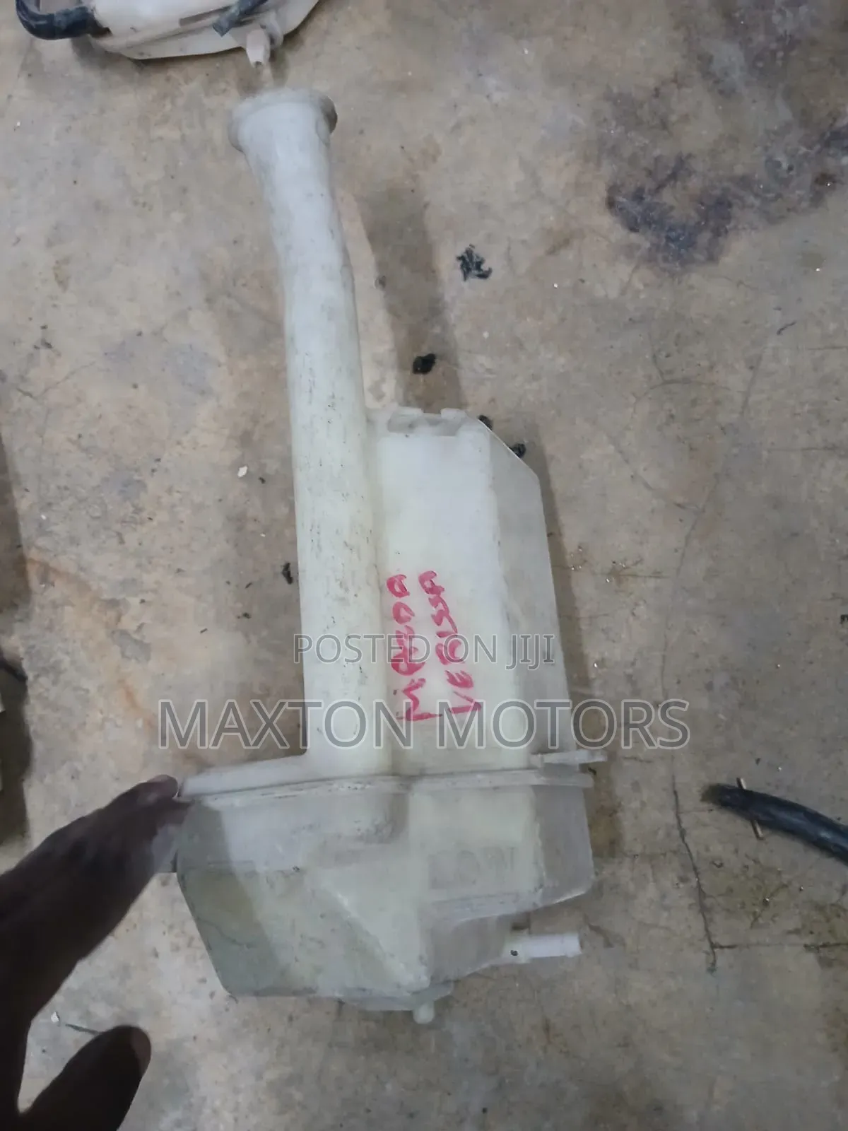 Mazda Verisa Washer Bottle