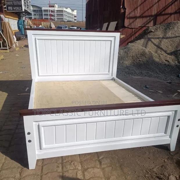 Panel Bed 5x6 White With Chocolate on Top.