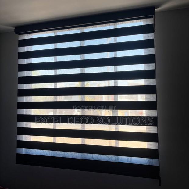 Zebra Roller Blinds With Elegant Striped Fabric Design