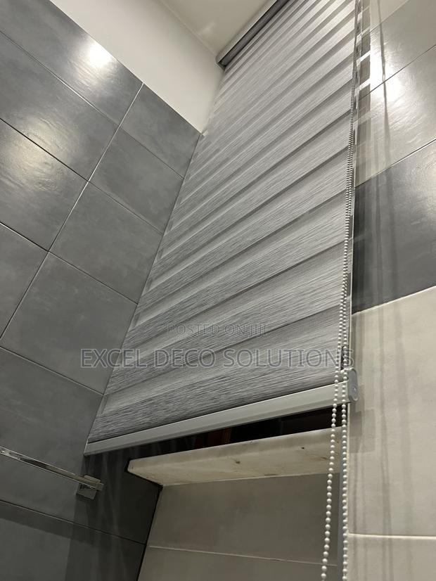 Zebra Roller Blinds for Daylight Privacy Management