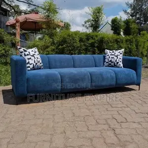 Modern Blue Sofa With Decorative Throw Pillows