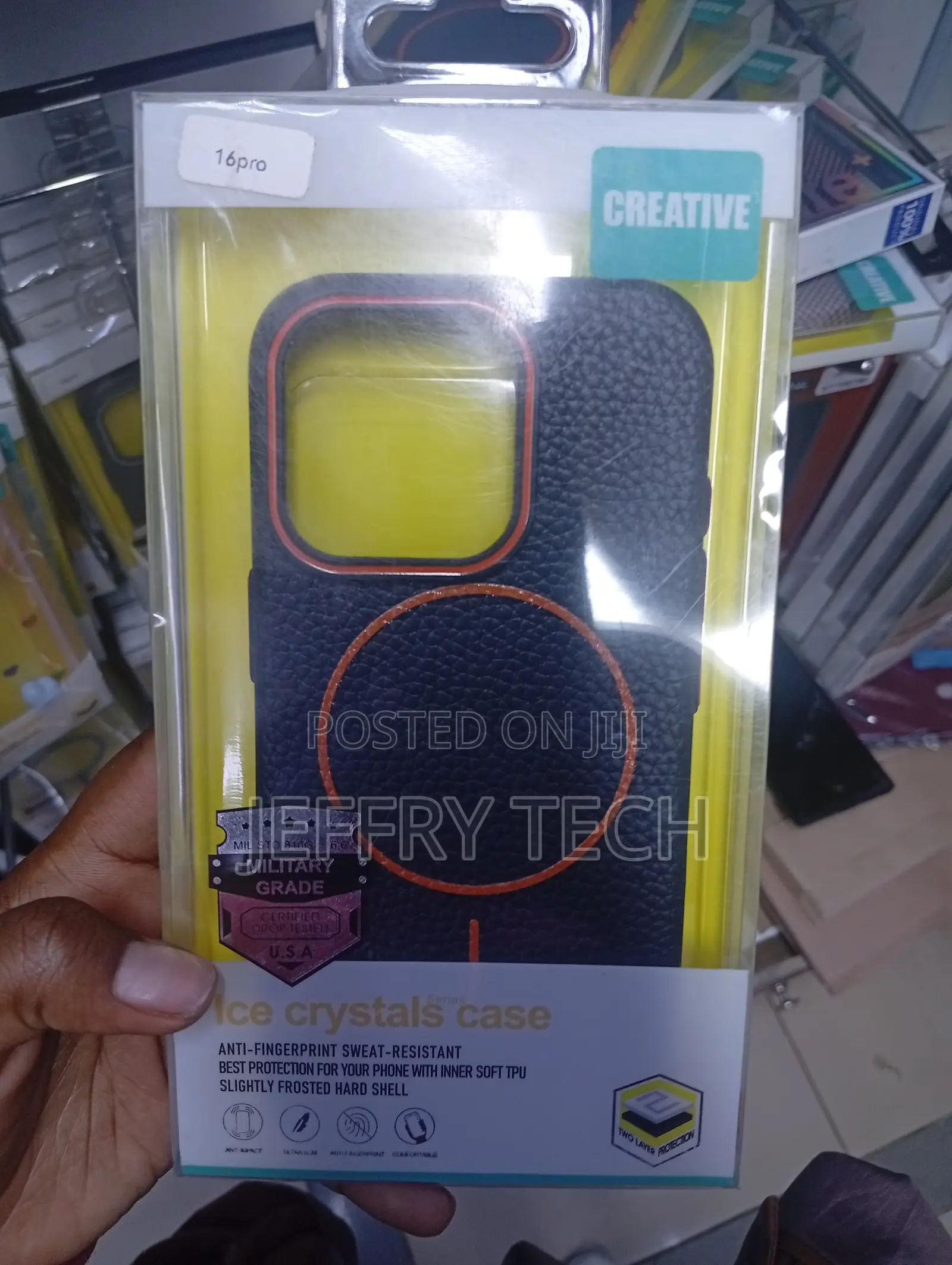 iPhone 16 Pro, Featuring a Blue Finish With Orange Accents