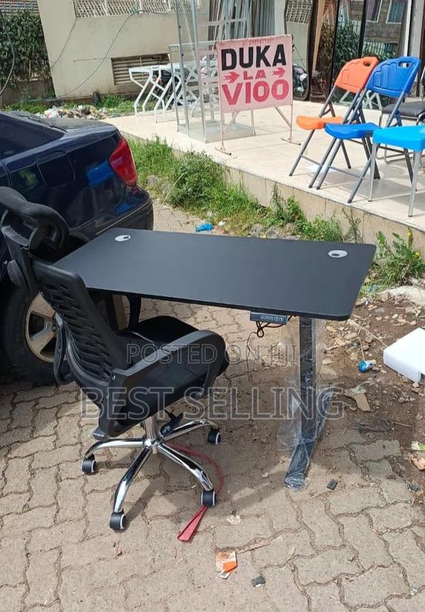 Black 1.2m Electric Adjustable Table and Headrest Chair - main view