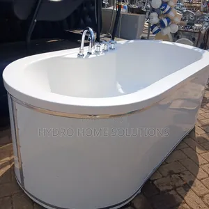 Modern Freestanding Bathtub With Inbuilt Mixers.