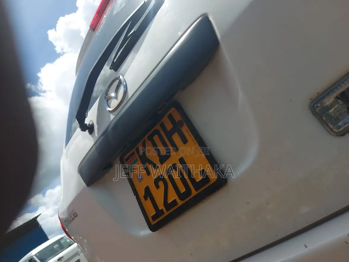 Mazda Familia 2015 White