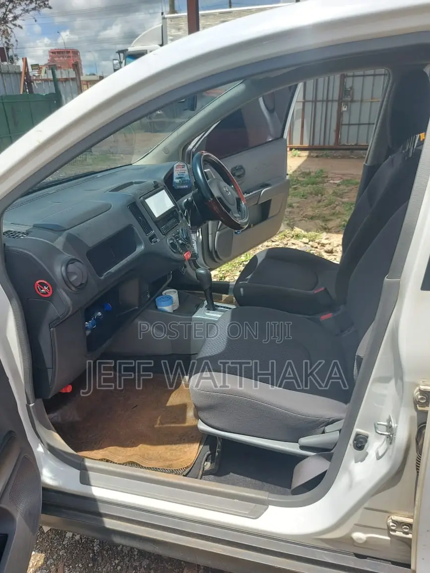Mazda Familia 2015 White