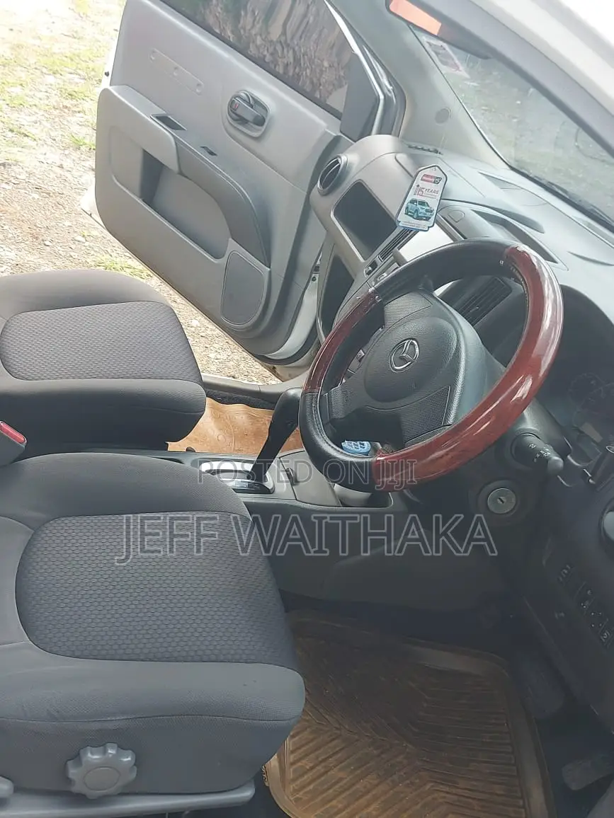 Mazda Familia 2015 White