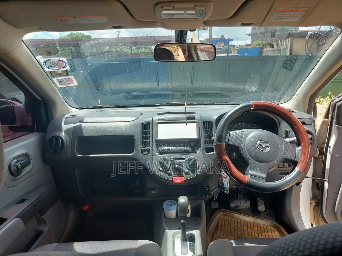 Mazda Familia 2015 White