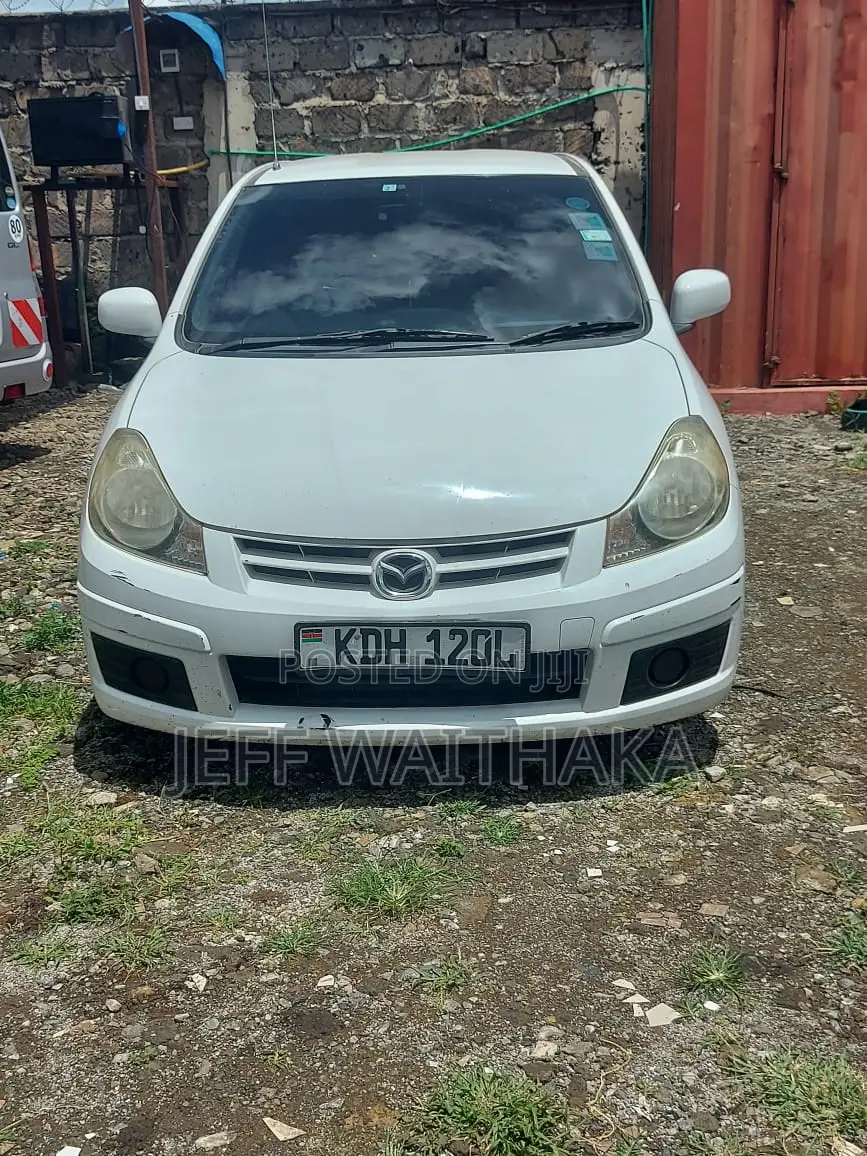 Mazda Familia 2015 White