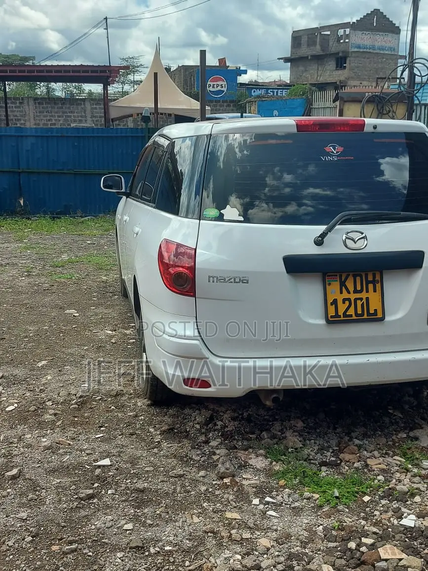 Mazda Familia 2015 White