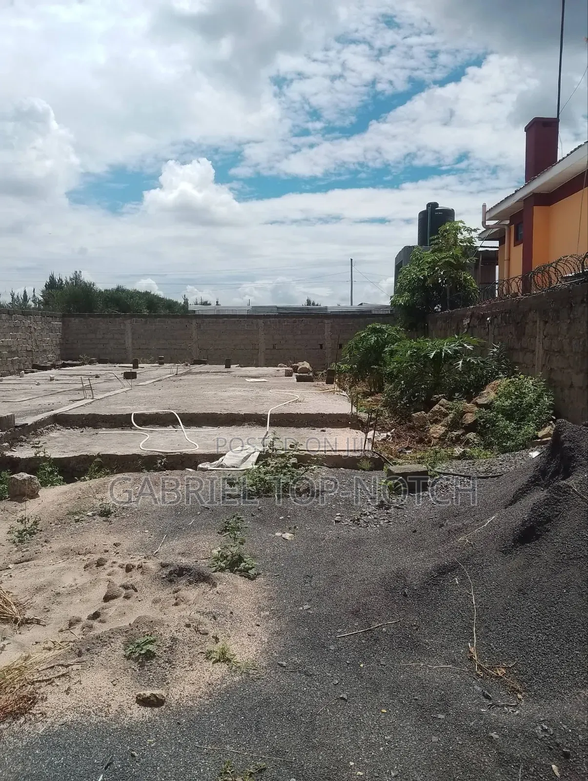 Very Prime Full 50 by 100 Plot, With Perimeter Wall and Foundation
