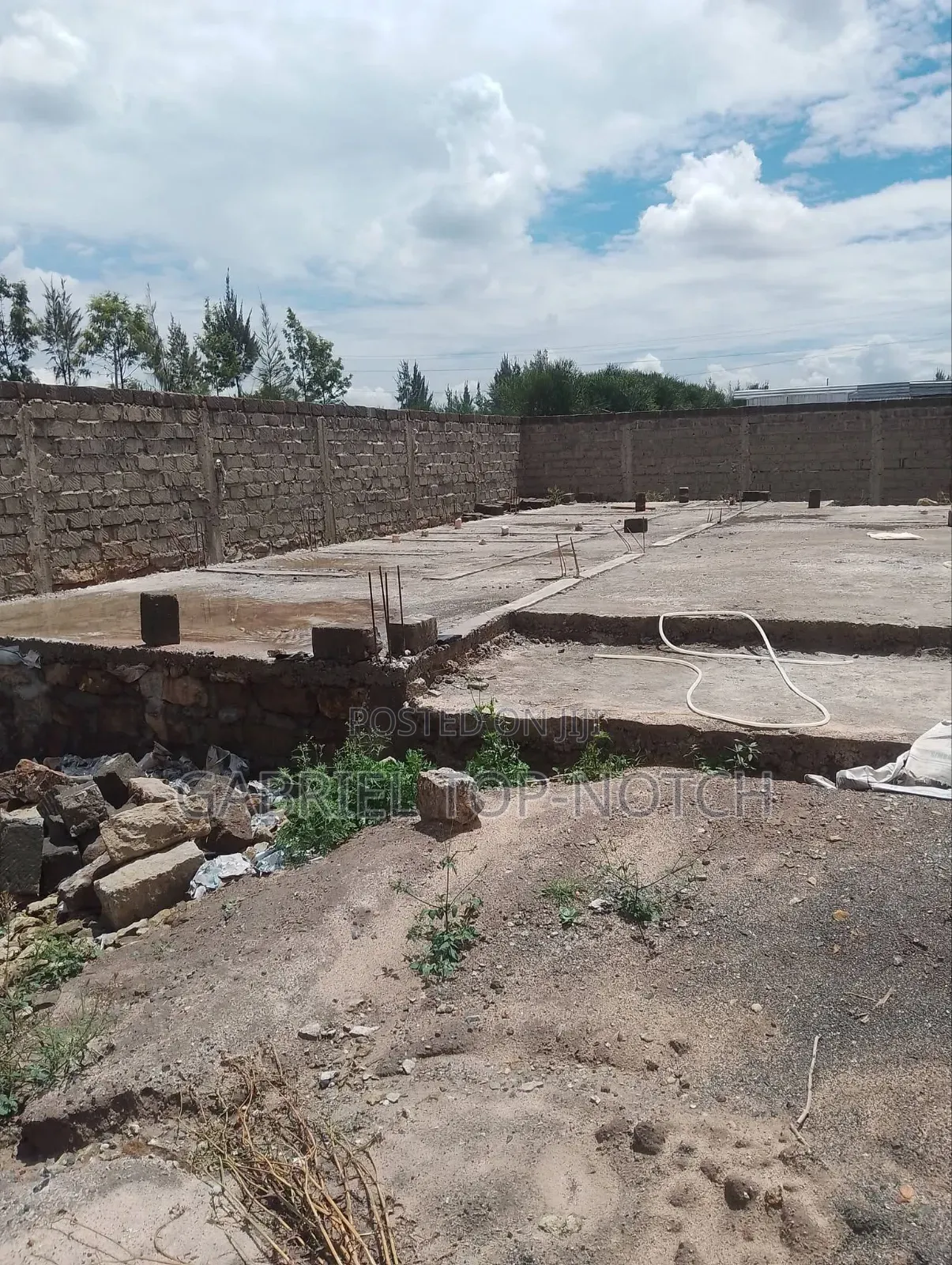 Very Prime Full 50 by 100 Plot, With Perimeter Wall and Foundation