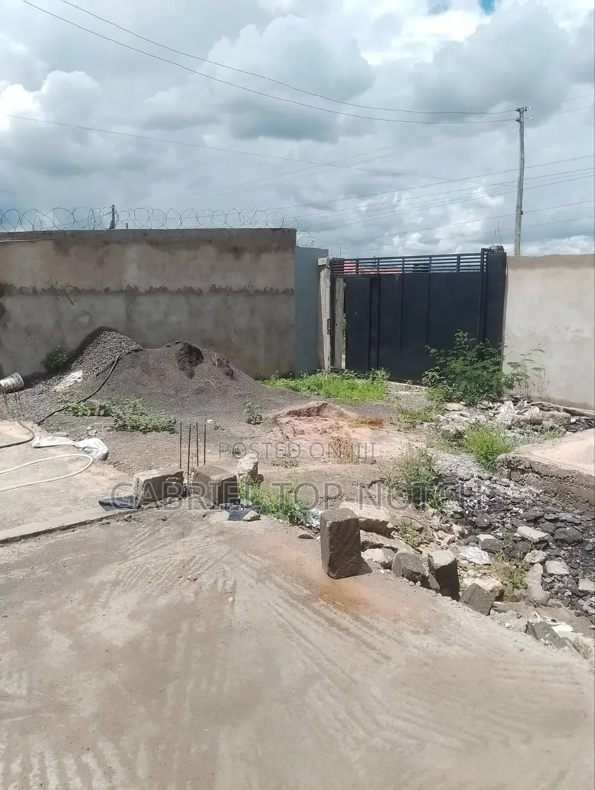 Very Prime Full 50 by 100 Plot, With Perimeter Wall and Foundation