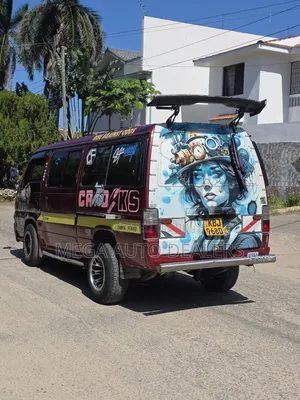 Nissan Caravan 2010 Burgundy