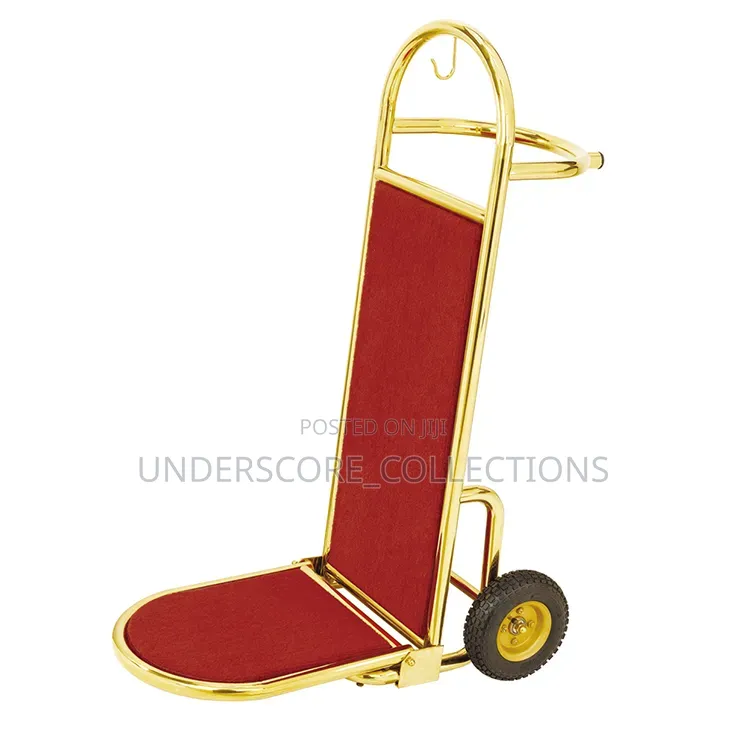 Golden Stainless Steel Luggage Trolley With a Red Carpeted Platform